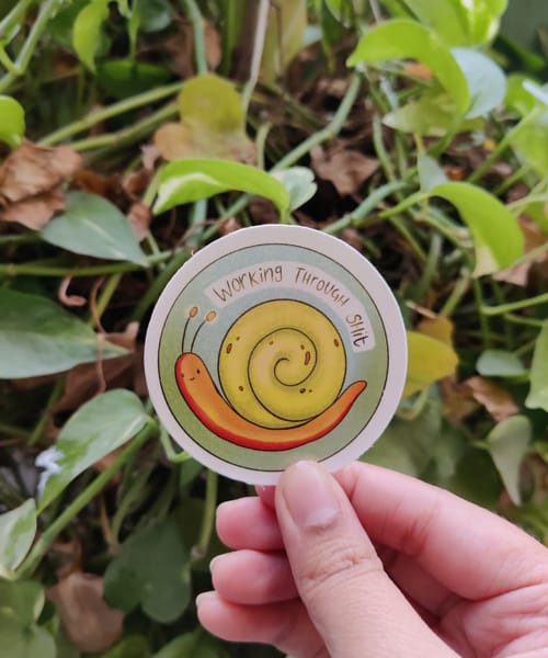 Working through shit sticker